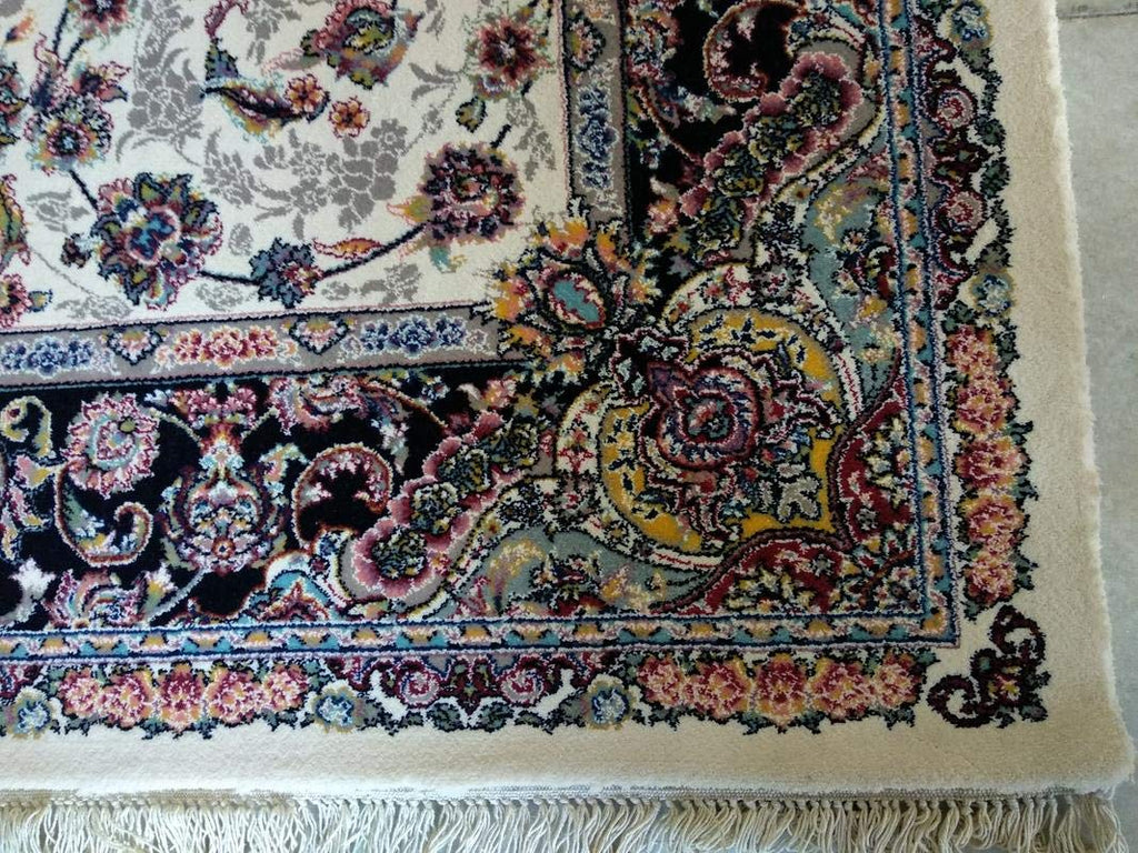Classic Irani Cream Carpet with Repeating Floral Motif Design