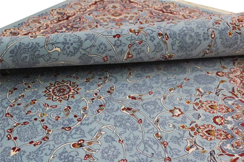 Soft Blue Irani Carpet with Subtle Vintage Floral Artwork