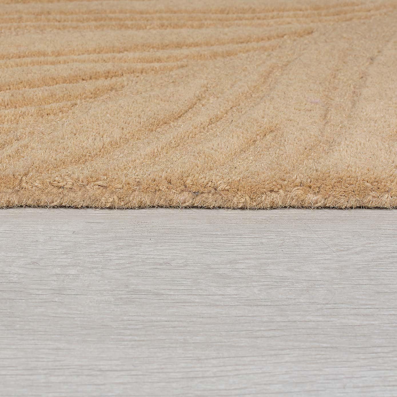 Beige Textured Leaf Hand Tufted Carpet