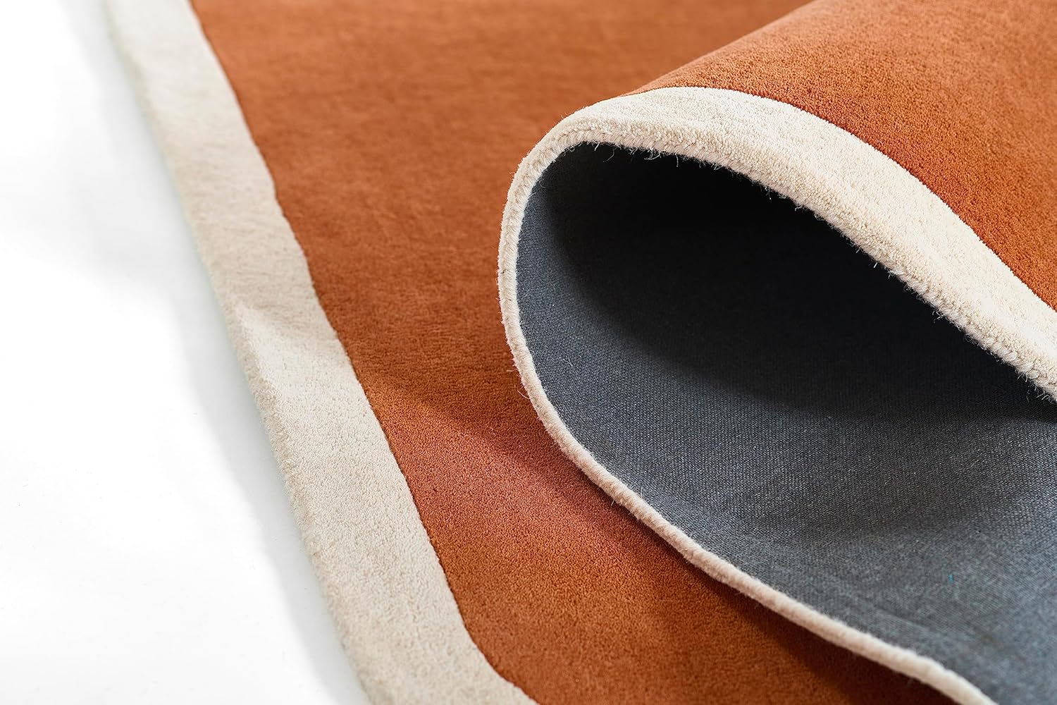 Warm terracotta center with ivory border Rug