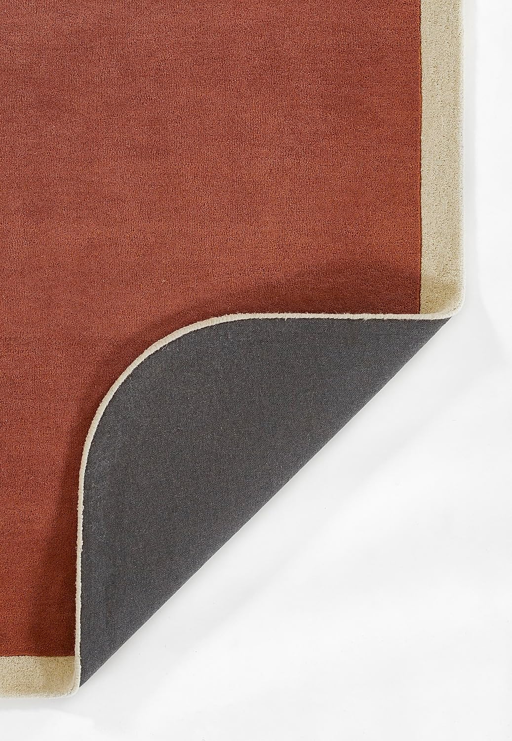 Warm terracotta center with ivory border Rug