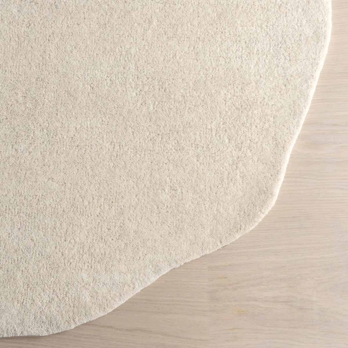 Off-White Asymmetrical Riverstone Carpet