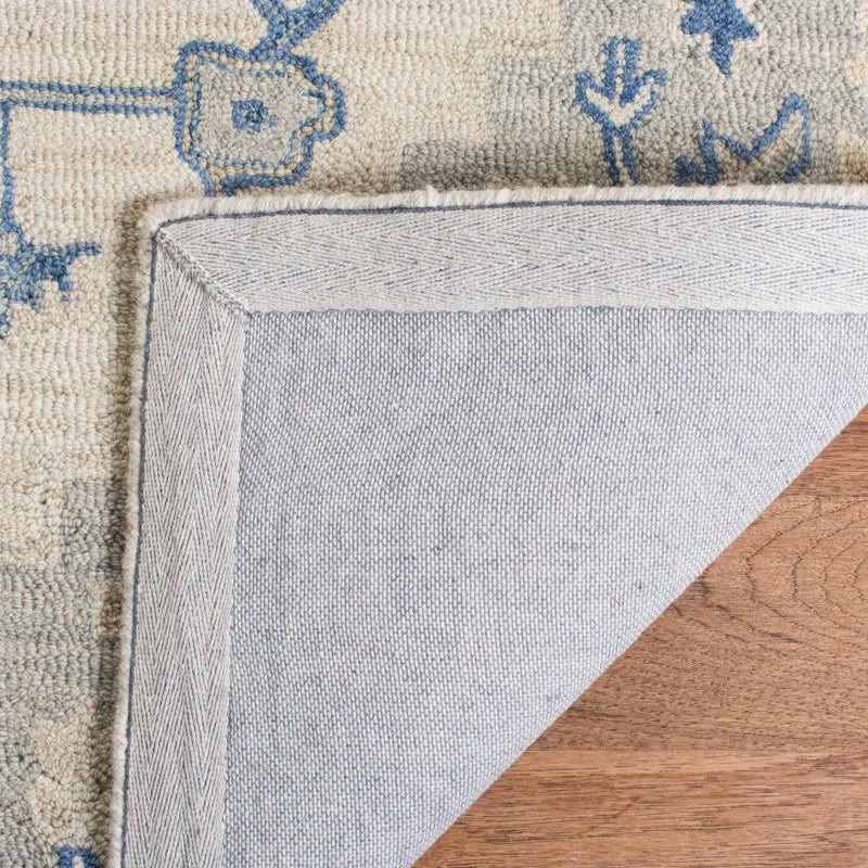 Exquisite Hand-Tufted Ivory Wool Rug