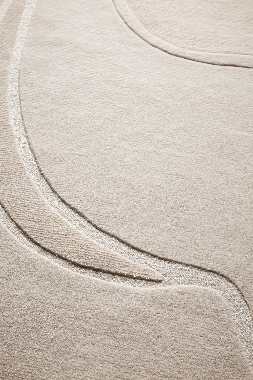 Hand-Tufted Fluid Form with Subtle Relief Detailing