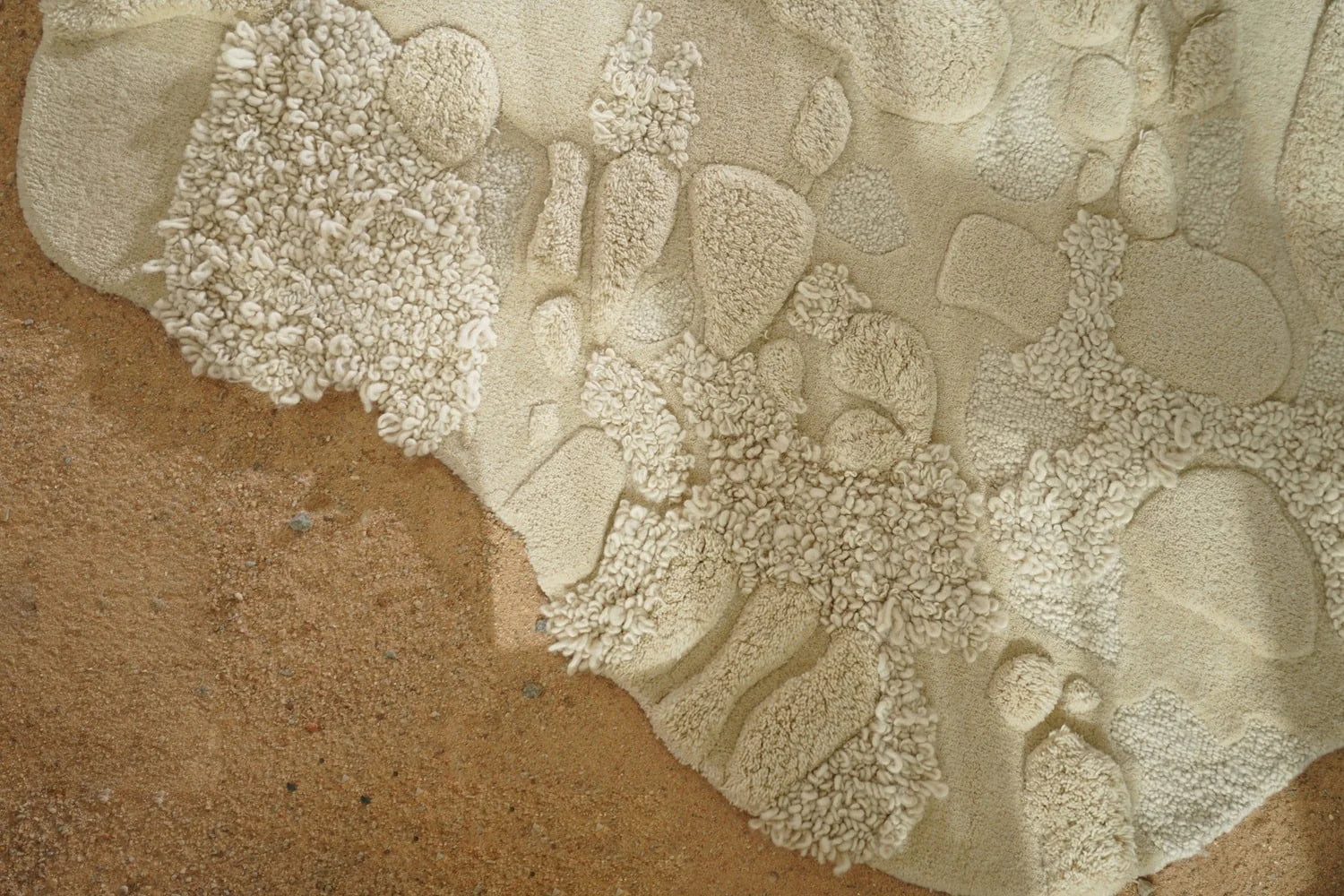 Cream Sculpted Pebble Irregular Rug