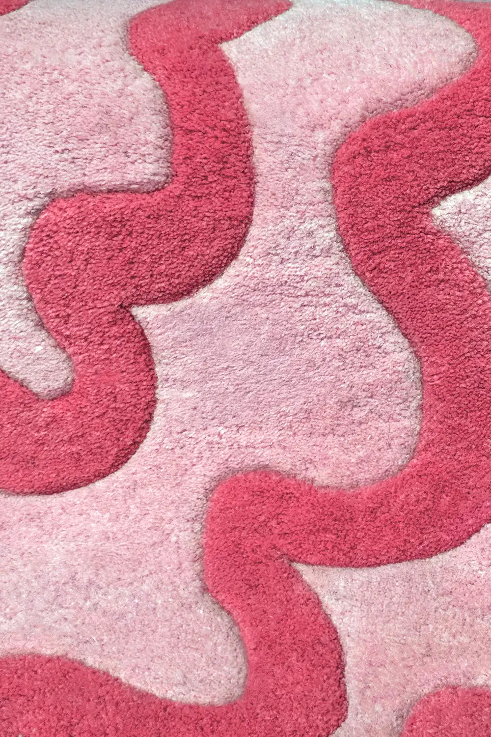 . Artistic Scalloped Pink Area Rug